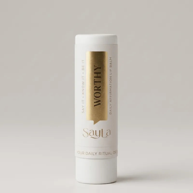 Sayla Worthy Vanilla Bliss Daily Affirmation Lip Balm on a light gray background