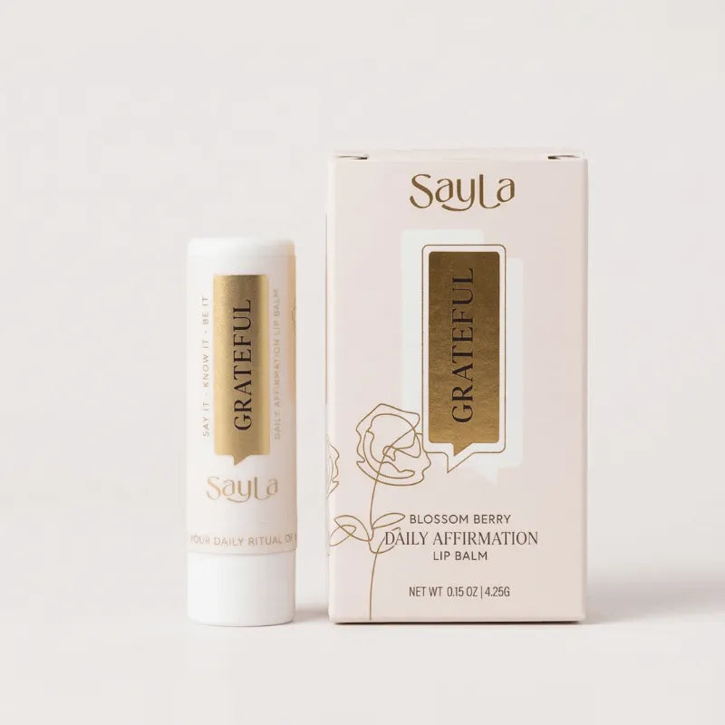 SayLa Grateful lip balm and packaging on a white background