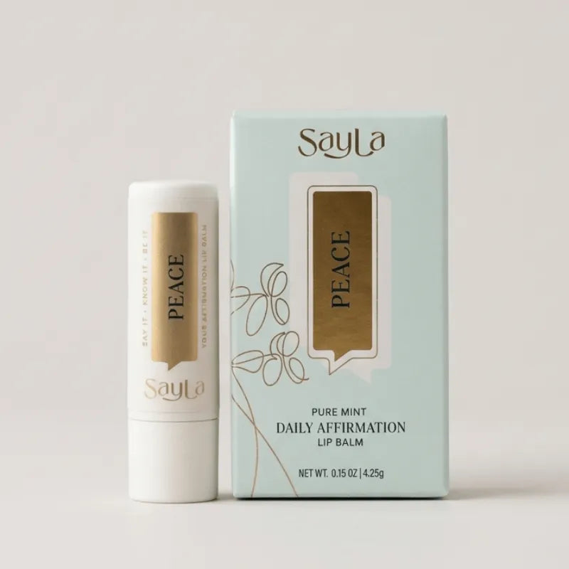 Sayla Peace lip balm and packaging on a light background